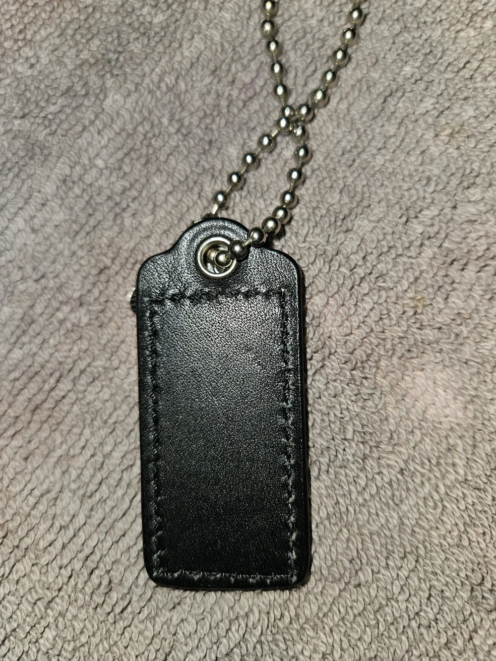 COACH Hangtag, Key Tag with Silver Key Charms. 25.00 Each